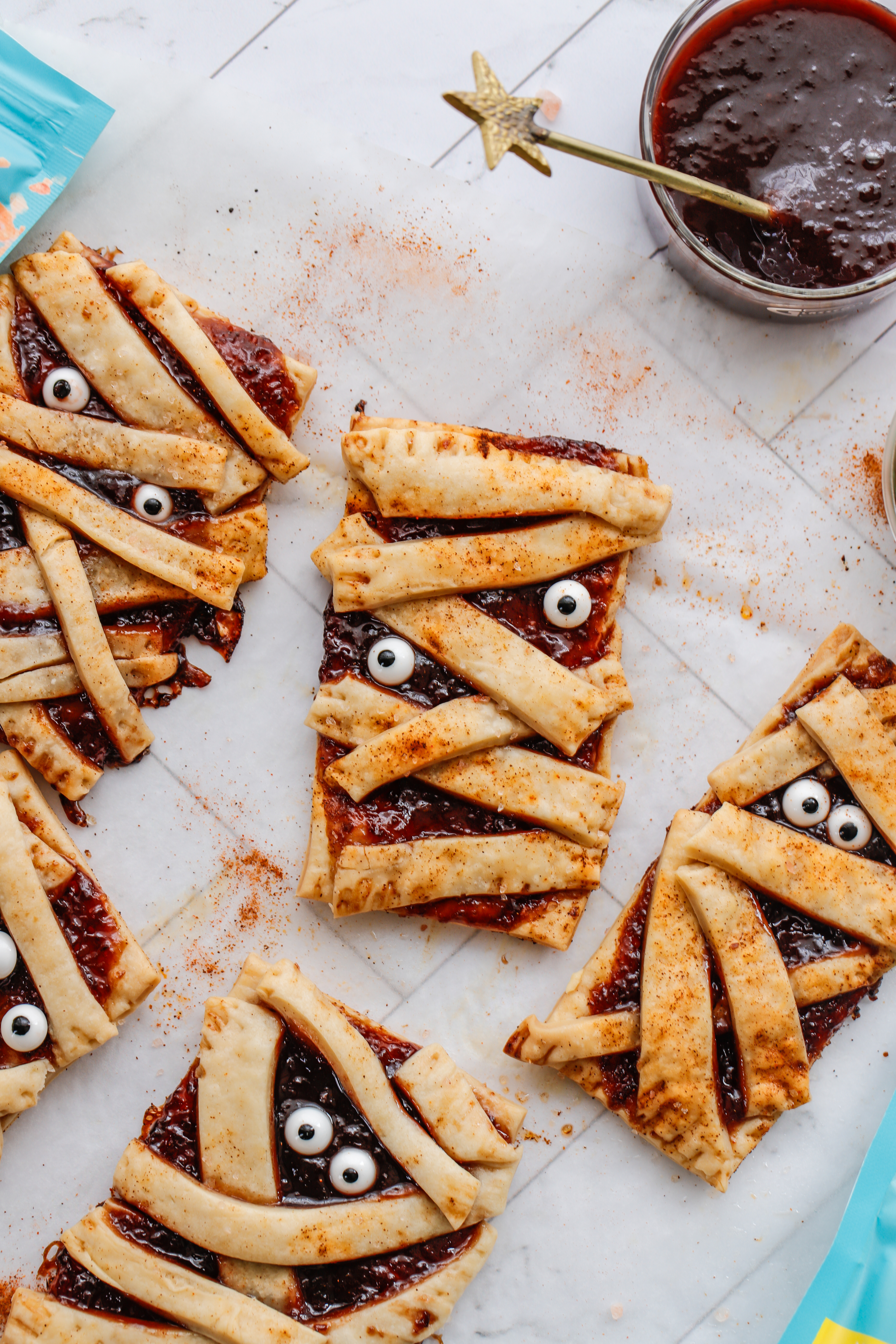 Tomato mummy puff pastry tarts